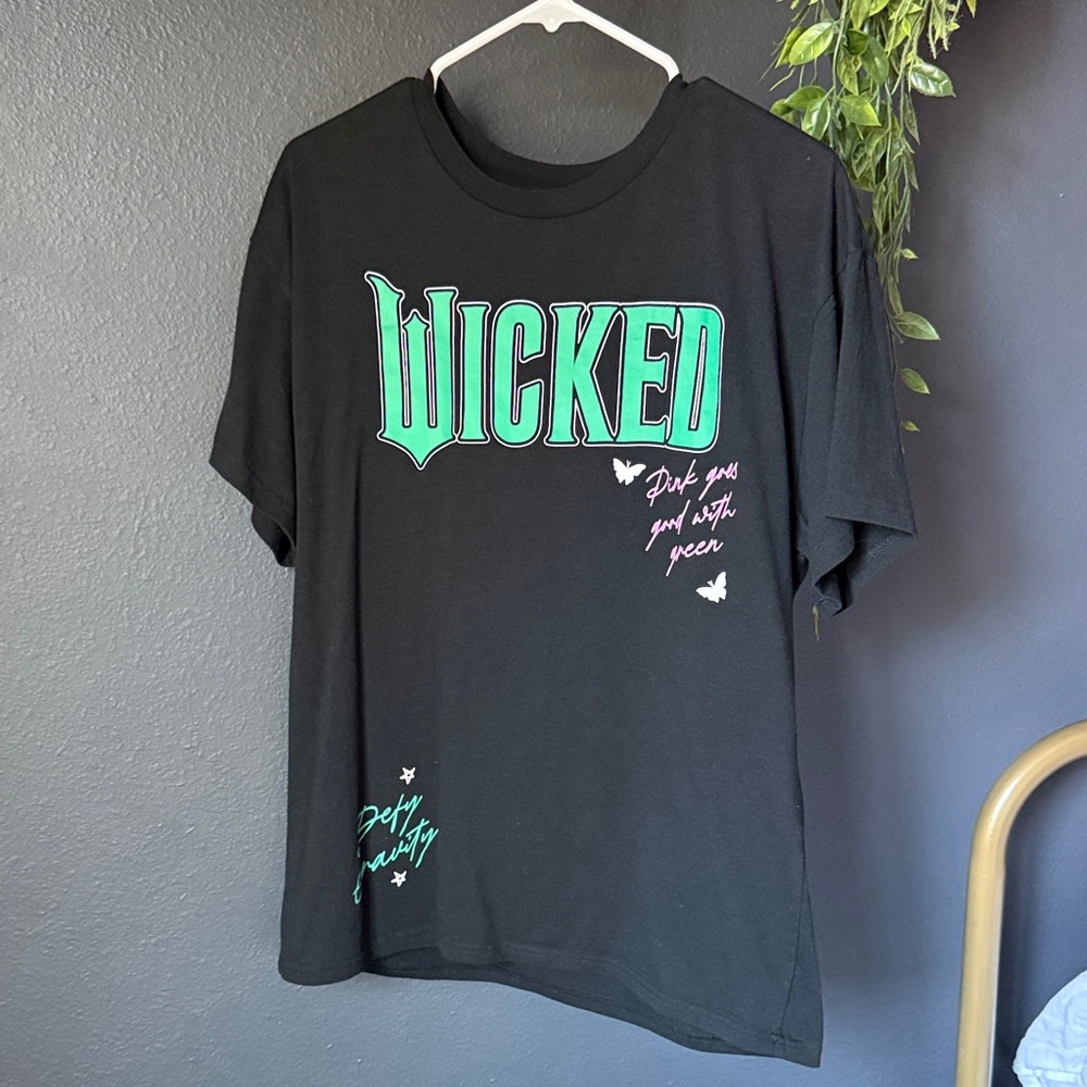 Universal Black Tee with Green and Pink Accents